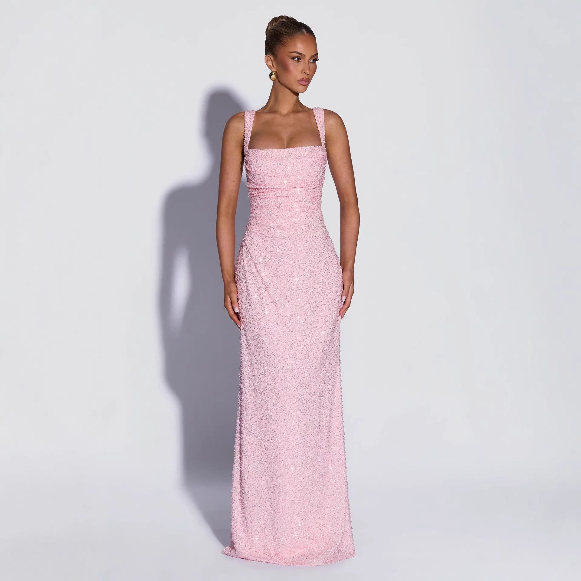 Vestido largo sin mangas, palabra de honor, con lentejuelas y abertura