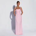 Sleeveless, strapless, sequined, and slit maxi dress